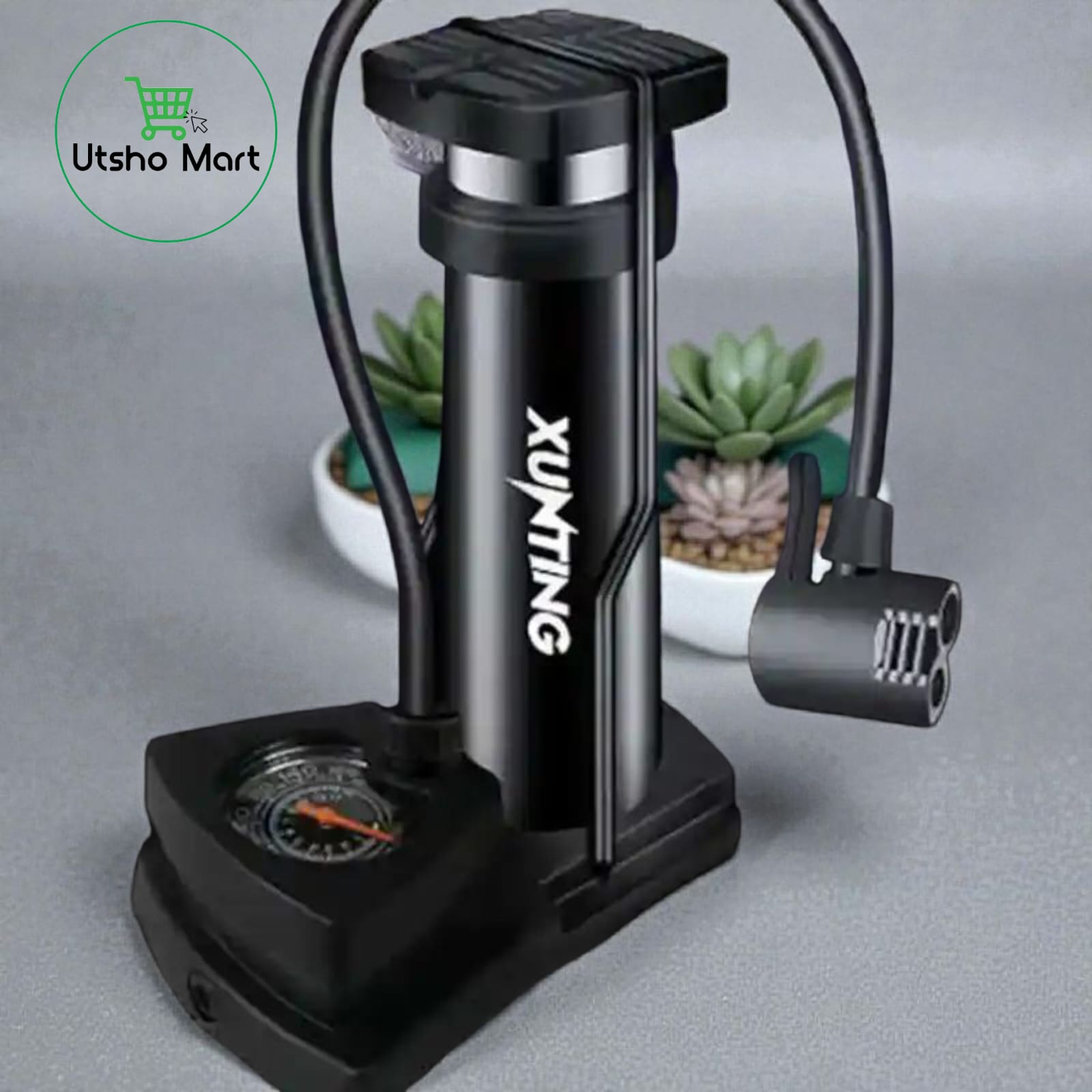 Foot pump with manometer